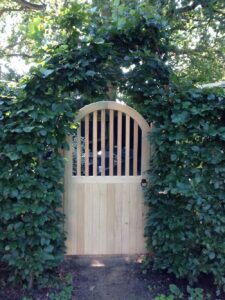 Arched Slatted Framed ledged and braced Gate