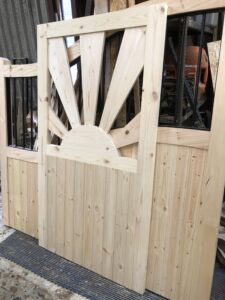 Timber gate with decorative detail