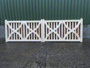White slatted timber gates