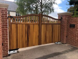 Arched gates with slatted detail